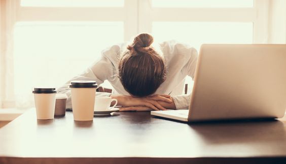 Tired businesswoman in the office